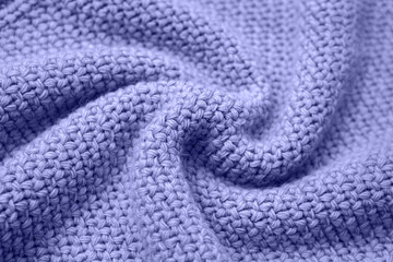 Fototapeta na wymiar Color of the year 2022 very peri. Knitted sweater texture closeup. Trendy soft abstract background.