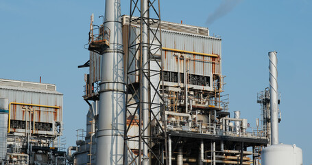 Industrial factory plant over blue sky