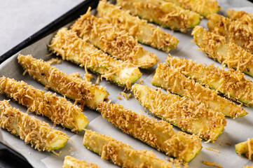 chopped zucchini, baked, breaded in breadcrumbs with egg