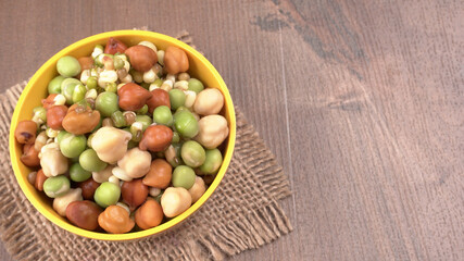 Healthy diet and vegetarian food. Mix of fresh sprouts on beautiful background. macrobiotic food. Sprouted wheat, peas, lentil seeds. Copy space 