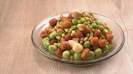 Healthy diet and vegetarian food. Mix of fresh sprouts on beautiful background. macrobiotic food. Sprouted wheat, peas, lentil seeds. Copy space 