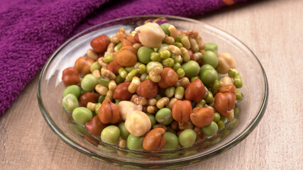 Healthy diet and vegetarian food. Mix of fresh sprouts on beautiful background. macrobiotic food. Sprouted wheat, peas, lentil seeds. Copy space 