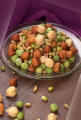 Healthy diet and vegetarian food. Mix of fresh sprouts on beautiful background. macrobiotic food. Sprouted wheat, peas, lentil seeds. Copy space 