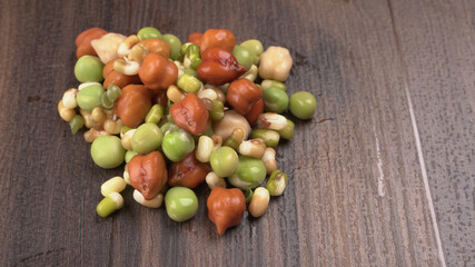 Healthy diet and vegetarian food. Mix of fresh sprouts on beautiful background. macrobiotic food. Sprouted wheat, peas, lentil seeds. Copy space 