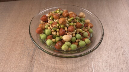 Healthy diet and vegetarian food. Mix of fresh sprouts on beautiful background. macrobiotic food. Sprouted wheat, peas, lentil seeds. Copy space 