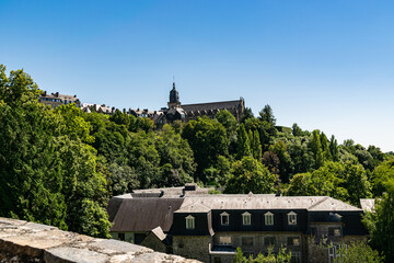 View of the church of Saint-Léonard de Fougères and old buildings in the city Fougères.Saint-Léonard de Fougères is one of the parish churches in Fougères, France.