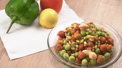 Healthy diet and vegetarian food. Mix of fresh sprouts on beautiful background. macrobiotic food. Sprouted wheat, peas, lentil seeds. Copy space 