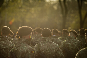 Romanian army soldiers prepare for the Romanian national day military parade.