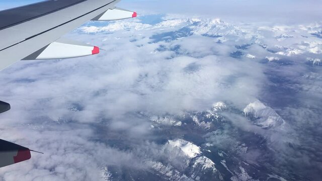 Aeroplane above the cloud with turbulence 