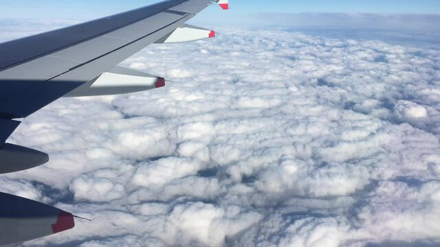 Aeroplane above the cloud with turbulence 