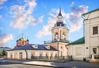 Bell tower and temple of the Znamensky monastery on Varvarka street in Moscow. Inscription: street Varvarka