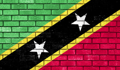 Saint Kitts and Nevis flag on a brick wall