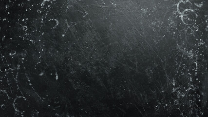 Black stone background. Black surface. Top view. Free space for your text.