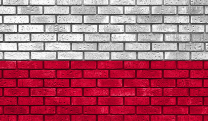 Fototapeta na wymiar Poland flag on a brick wall