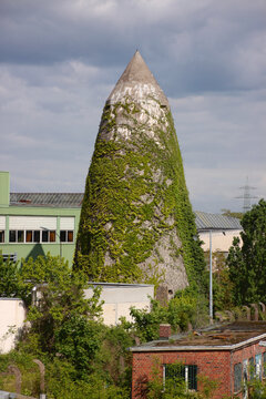 Conical air raid bunker remaining from World War II in an industrial area in Darmstadt city, Germany