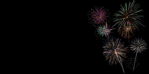 Fireworks against a black sky, with copy space