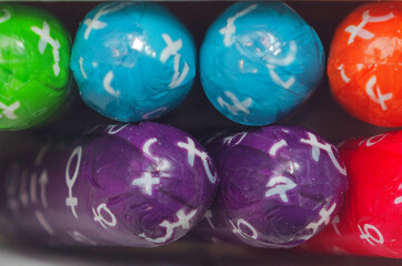 multicolored female tampons in a package, close-up