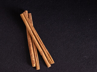 Cinnamon stick on black background