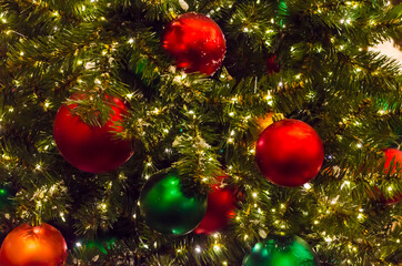 Obraz na płótnie Canvas Christmas Tree with Red Balls and Stars. Winter Holiday Background