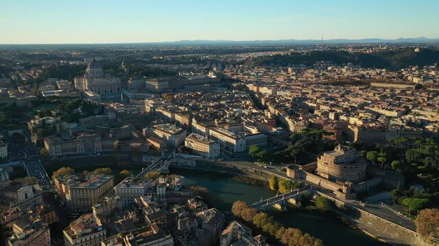 Aerial drone rotational video of iconic Castel Sant'Angelo a fortified medieval castle housing paintings collections in Renaissance style, historic city of Rome, Italy