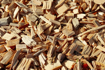 small chopped wooden pieces in the sunlight