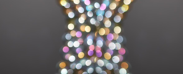 defocused lights on a gray background with copy space
