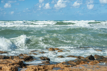 A strong November wind drives roaring waves to the shore, tearing white foam from them. All the beaches of Paphos and nearby villages are flooded with stormy waters.       