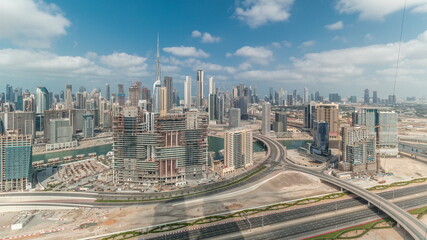 Fototapeta na wymiar Panoramic skyline of Dubai with business bay and downtown district timelapse.