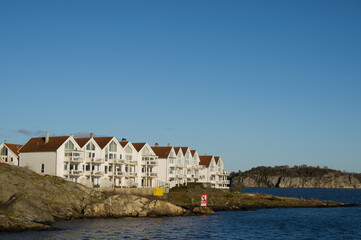 Scenic cityscape of modern norwegian town. Modern white architecture of Stavanger. Sunny day. Lusefjord.