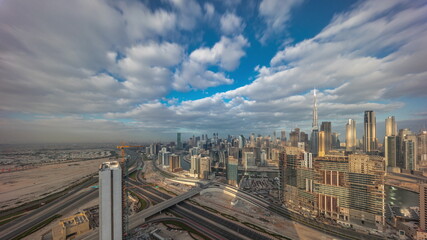Panoramic skyline of Dubai with business bay and downtown district morning timelapse.