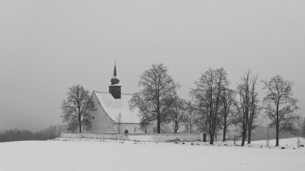 Small old chapel Brno - Veveri. Beautiful snowy landscape. Winter nature - seasonal concept.