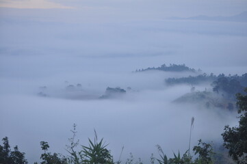 Obraz na płótnie Canvas morning mist See Long Sang Viewpoint, Piang Luang, Wiang Haeng District, Chiang Mai