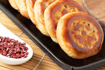 Traditional japanese manju stuffed with red bean paste, selective focus.