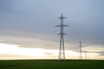 New installed barriers for electricity transmission in the meadows.