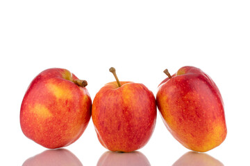 Three ripe juicy apples, close-up, isolated on white.