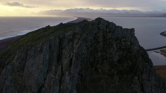 Aerial view of black beach Hvalnes Natural Reserve Beach during sunset, in Iceland.
