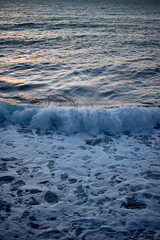 sea ​​surf at sunset