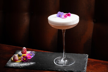 tasty cocktail with edible flowers