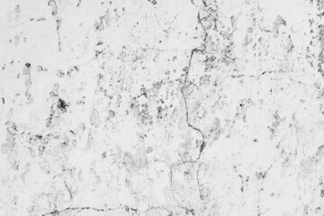 Texture of a concrete wall with cracks and scratches which can be used as a background
