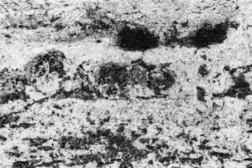 Texture of a concrete wall with cracks and scratches which can be used as a background