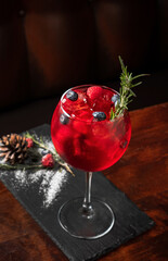 Christmas morning composition with cranberry, rosemary  and blueberry