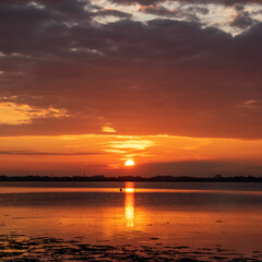 sunset over the water