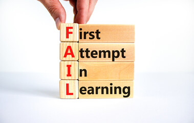 FAIL first attempt in learning symbol. Wooden blocks with words FAIL first attempt in learning....