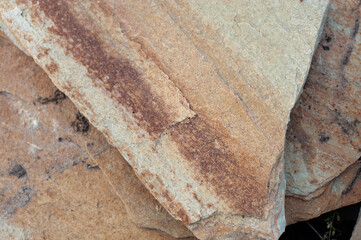 A mountain of gold, red stones from shale rocks