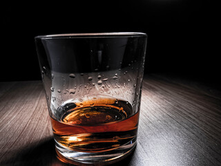 drink with ice on a wooden table