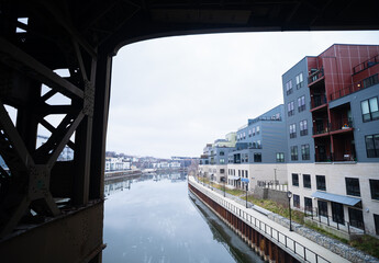 A view of the city from beneath a bridge over the Milwaukee River on a cold day in Milwaukee,...