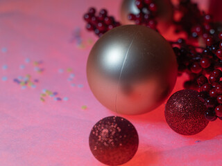 Spruce twigs and Christmas tree decorations,.  There is room for text. Concept, holiday, congratulation.