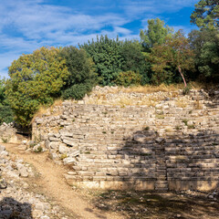 ruins of antique theater among the forest in the ancient city of Phaselis, Turkey