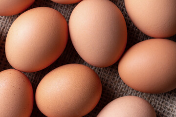 fresh eggs on jute cloth