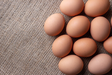 fresh eggs on jute cloth